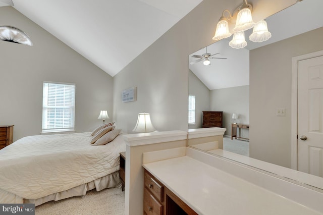 bedroom featuring light carpet and lofted ceiling