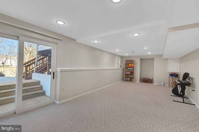 workout area featuring carpet, baseboards, and recessed lighting