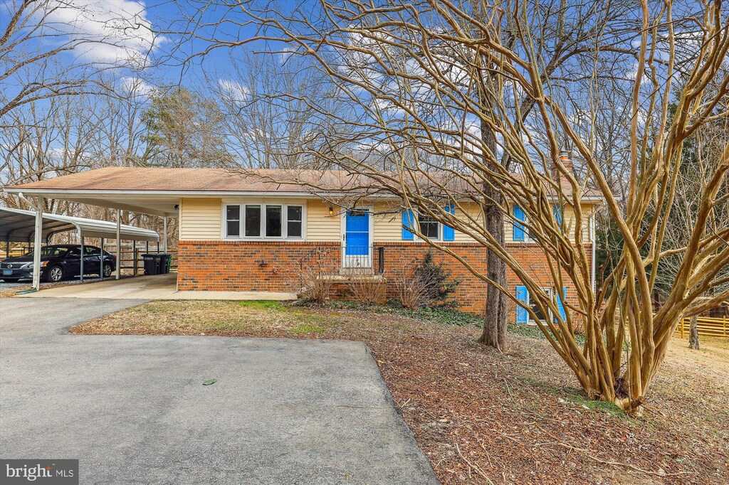 11800 Thrift Rd, Clinton, MD 20735 - view of front of property featuring brick siding and driveway