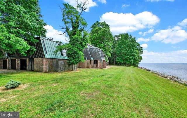 view of yard with a water view