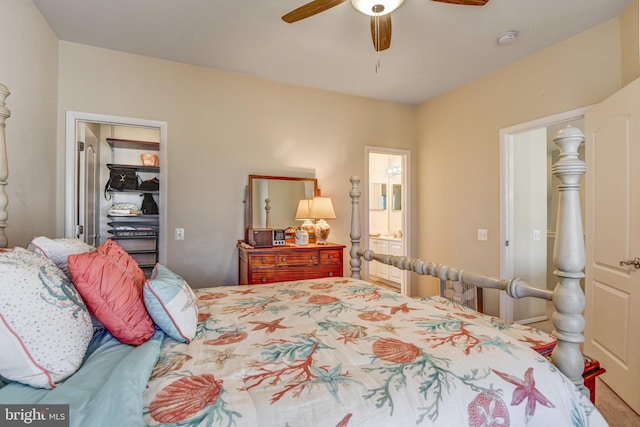 bedroom with ceiling fan and connected bathroom