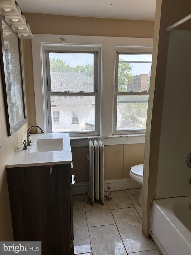 1428 W State St, Trenton, NJ 08618 - full bath featuring radiator and vanity