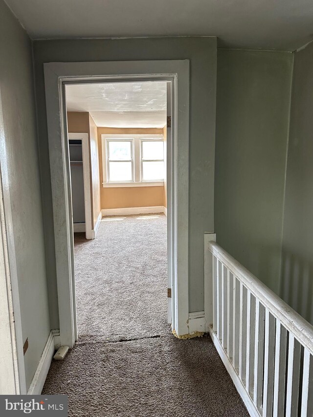 1428 W State St, Trenton, NJ 08618 - corridor with carpet flooring and an upstairs landing