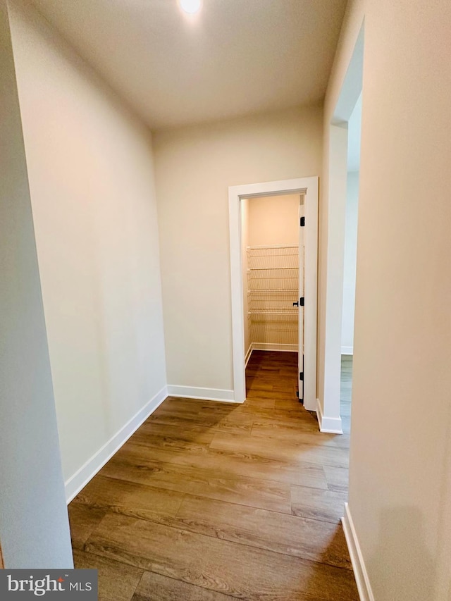 hallway featuring light wood-type flooring