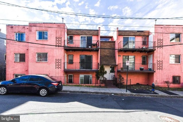 view of building exterior with central AC unit