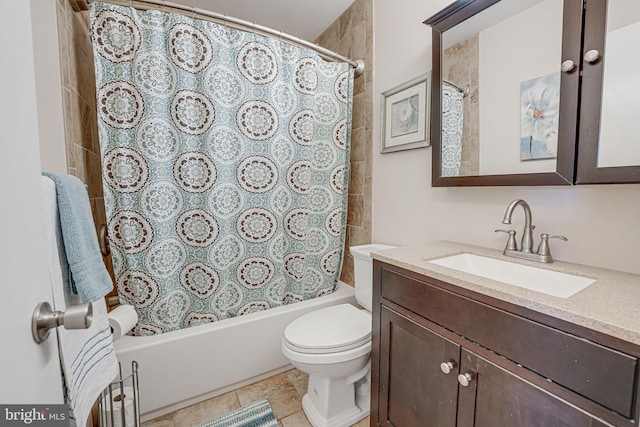 full bathroom with toilet, tile patterned floors, shower / bath combo, and vanity