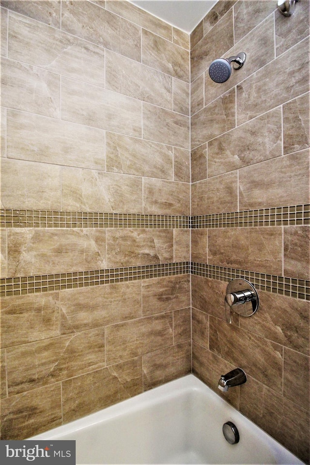 bathroom featuring bathtub / shower combination