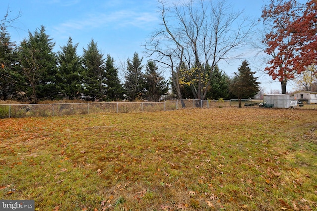 view of yard with fence