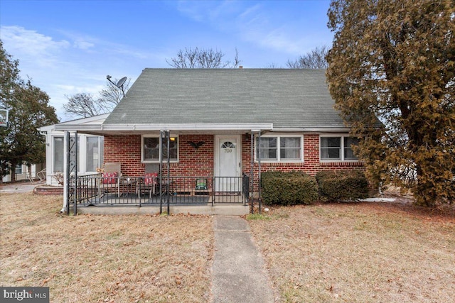 view of front of home with a front lawn