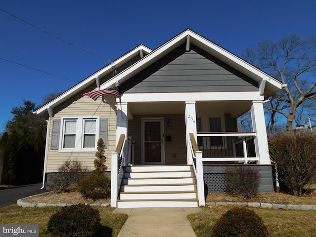 bungalow-style home with covered porch