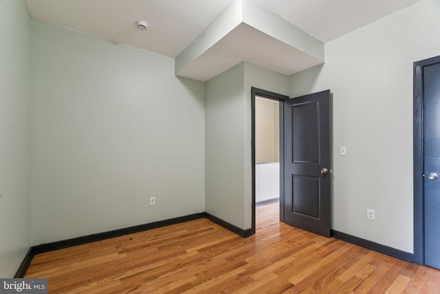 unfurnished bedroom featuring light hardwood / wood-style floors