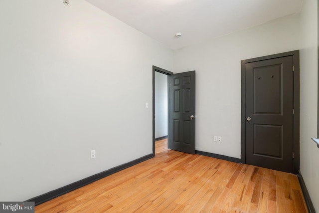 unfurnished bedroom featuring light hardwood / wood-style flooring