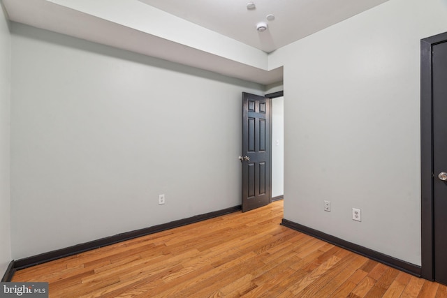 unfurnished room featuring light hardwood / wood-style flooring