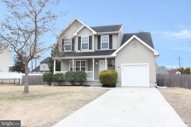 view of front of property featuring a porch and a garage