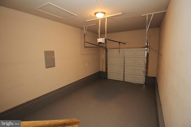 garage featuring a garage door opener and electric panel