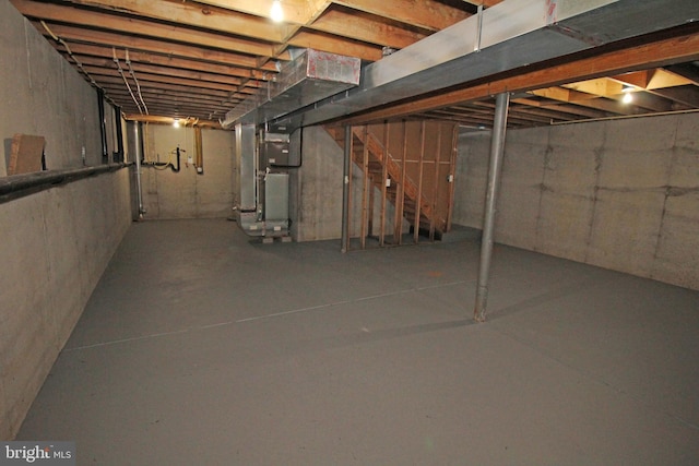 basement featuring heating unit