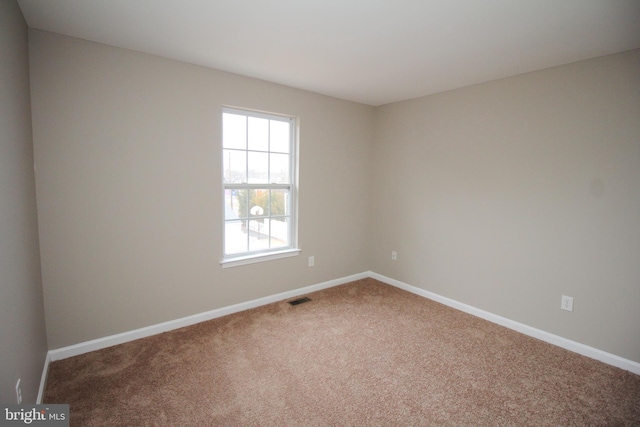 view of carpeted spare room