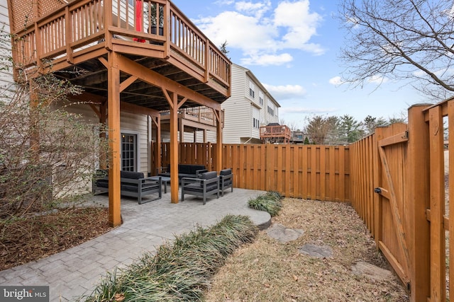 exterior space with a fenced backyard and an outdoor hangout area