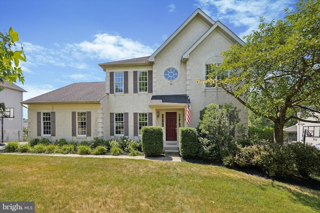 view of front facade with a front yard