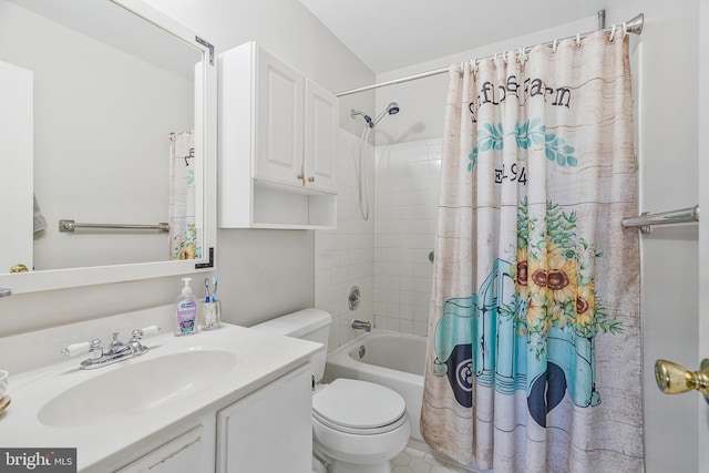 full bath with vanity, toilet, and shower / bath combo with shower curtain