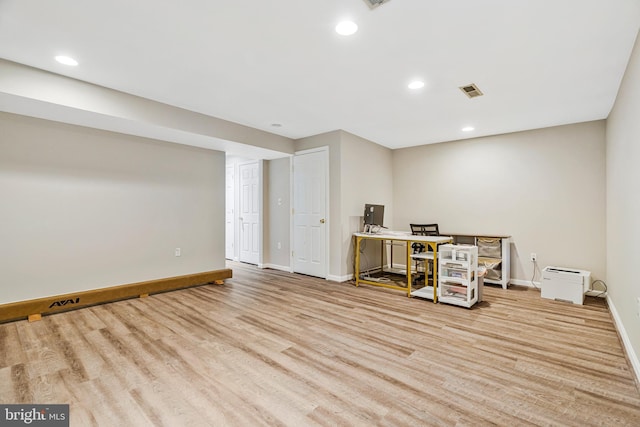 office area with recessed lighting, light wood-type flooring, and baseboards