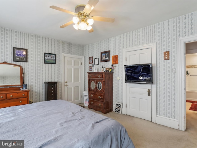 bedroom with ceiling fan and light colored carpet