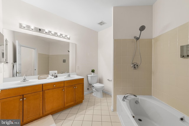 bathroom with shower / bathing tub combination, tile patterned flooring, a sink, and toilet