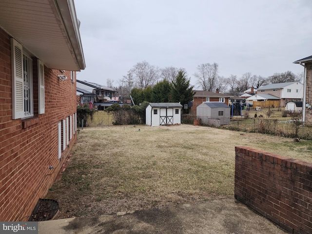 view of yard with a storage shed