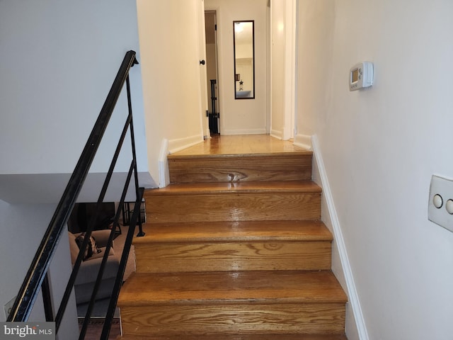 staircase with baseboards