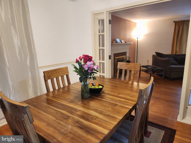 dining space featuring hardwood / wood-style floors