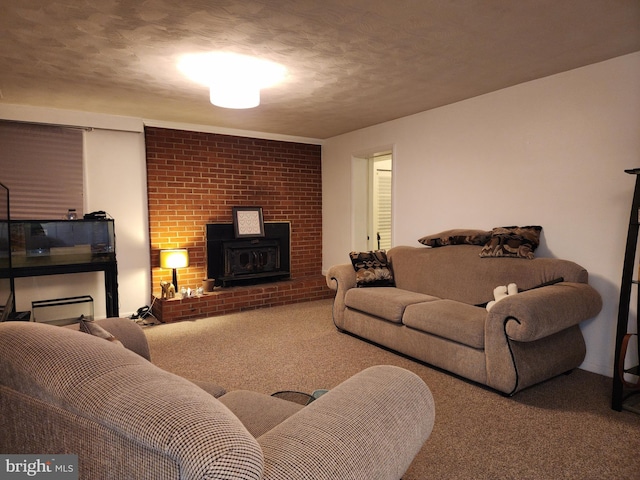 living room with a brick fireplace, carpet flooring, and a textured ceiling