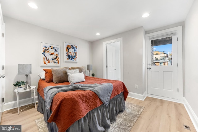 bedroom with light hardwood / wood-style floors