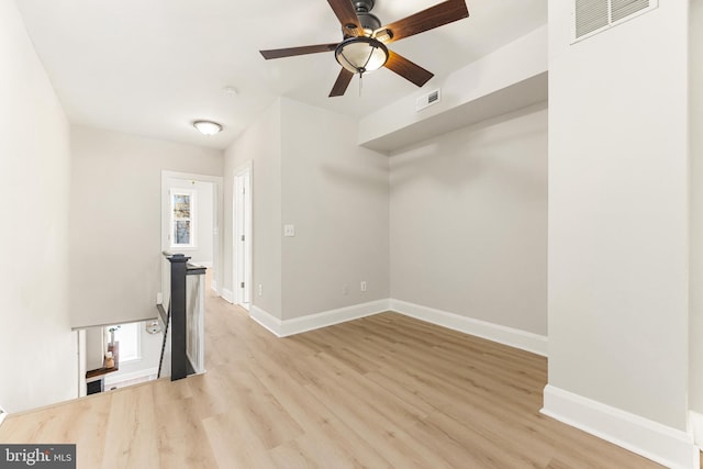 spare room featuring light wood-type flooring