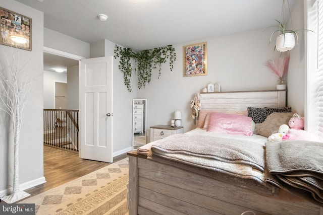 bedroom featuring light hardwood / wood-style flooring