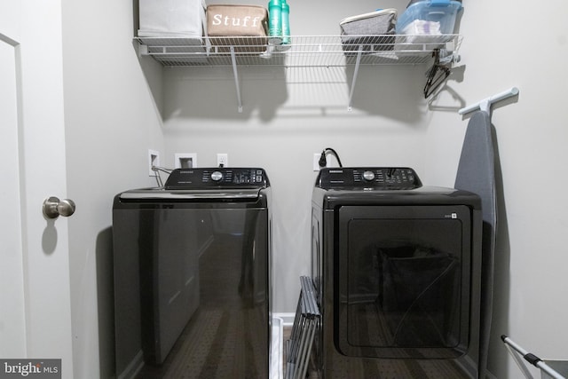 laundry area featuring separate washer and dryer