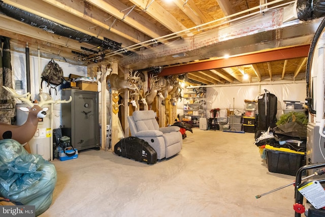 basement featuring water heater