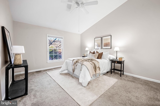 bedroom featuring lofted ceiling, carpet, and baseboards