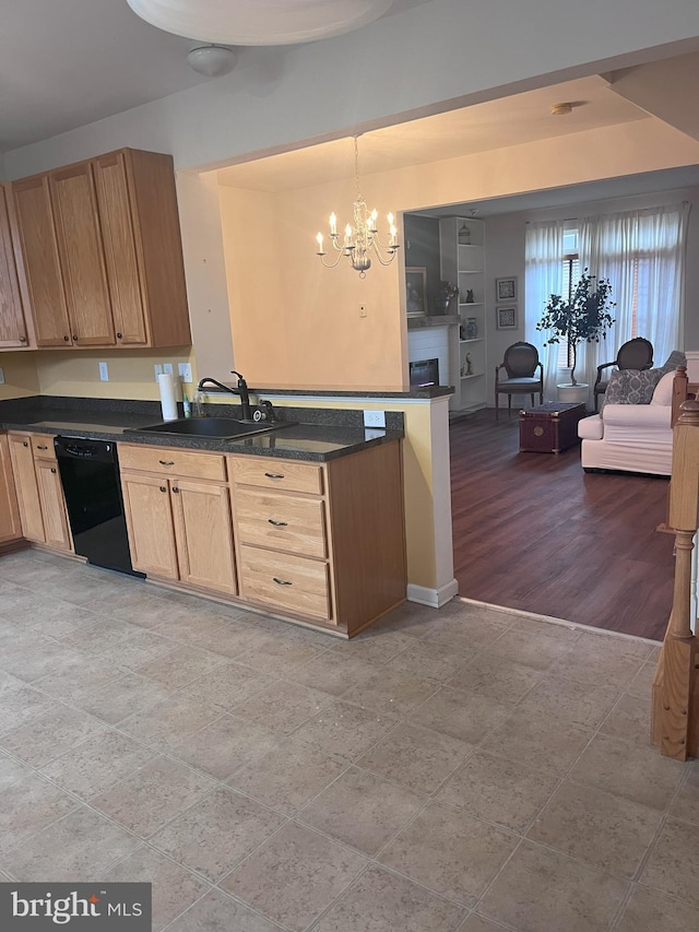 kitchen with kitchen peninsula, hanging light fixtures, sink, dishwasher, and a chandelier