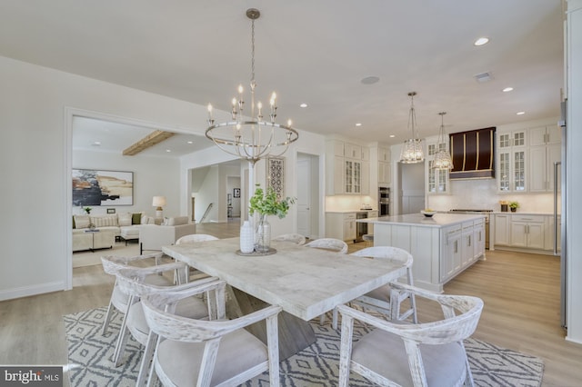 dining area with baseboards, visible vents, light wood-style flooring, a notable chandelier, and recessed lighting