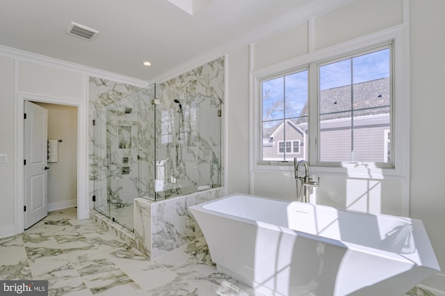 bathroom with marble finish floor, crown molding, a marble finish shower, recessed lighting, and a soaking tub