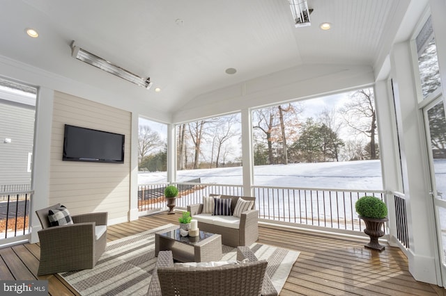 sunroom / solarium with vaulted ceiling