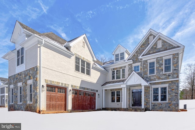 view of front of home with a garage