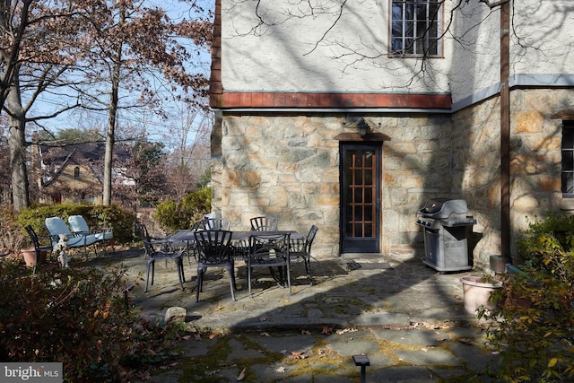 view of patio / terrace featuring outdoor dining space and area for grilling