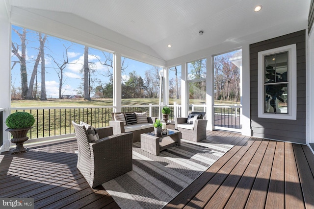 sunroom / solarium with an outdoor hangout area
