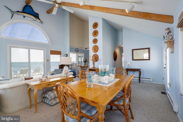 carpeted dining area with baseboard heating, a water view, high vaulted ceiling, and beamed ceiling