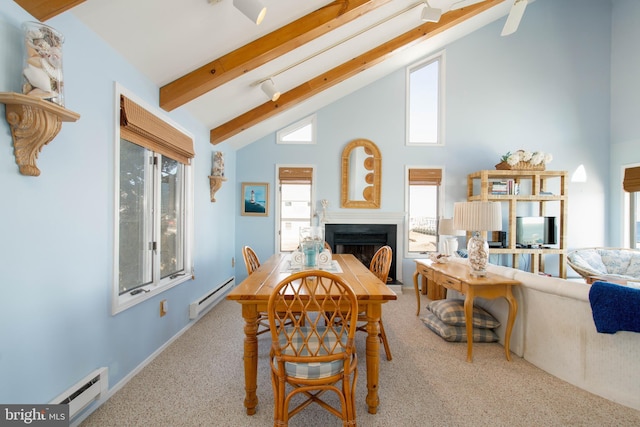 carpeted dining space with beam ceiling, high vaulted ceiling, and a baseboard heating unit