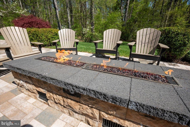 450 Marley Run, Huntingtown, MD 20639 - view of patio / terrace with an outdoor fire pit
