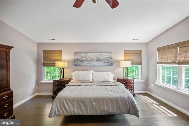 450 Marley Run, Huntingtown, MD 20639 - bedroom featuring baseboards, dark wood finished floors, ceiling fan, and visible vents