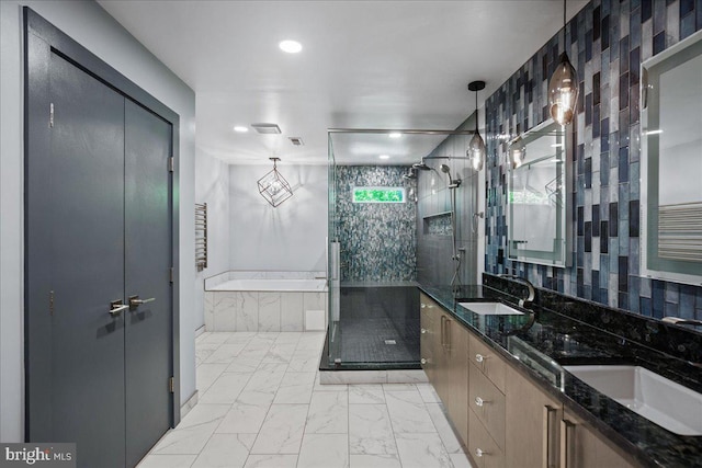 450 Marley Run, Huntingtown, MD 20639 - bathroom featuring a bath, a sink, marble finish floor, and a stall shower