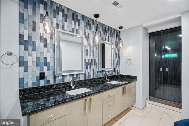 450 Marley Run, Huntingtown, MD 20639 - bathroom with double vanity, visible vents, a sink, and marble finish floor